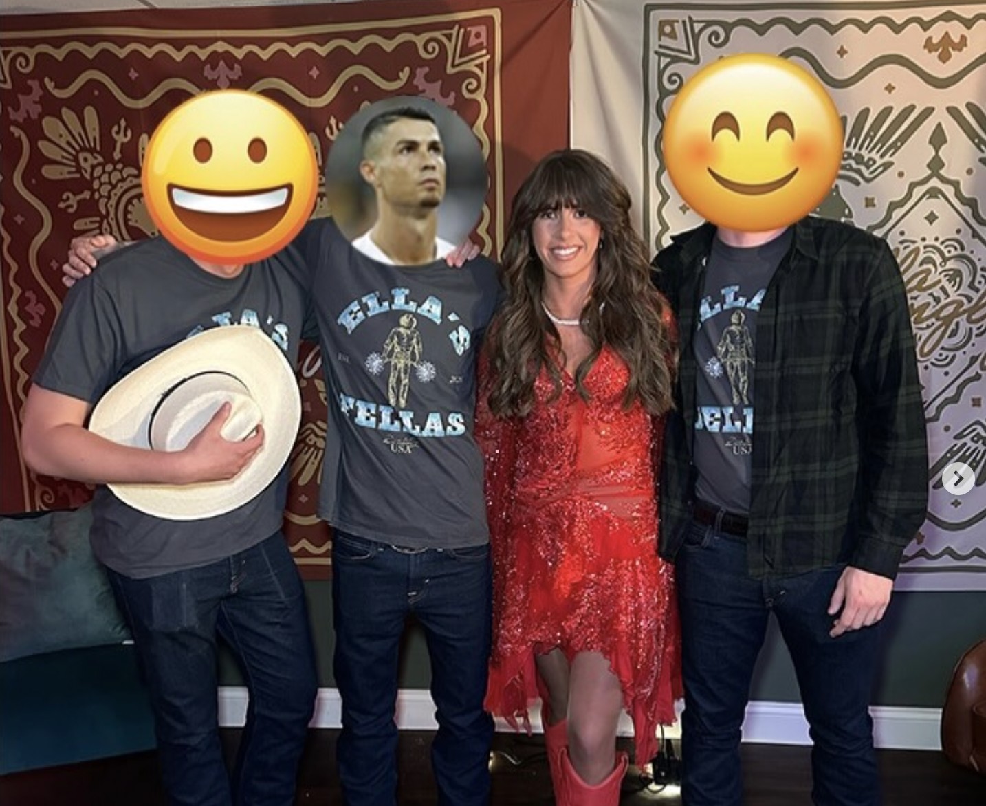Freddy and friends pose for a group photo with country music artist Ella Langley. Ella stands in the center wearing a red sequined outfit and red boots, while the three fans wear matching 